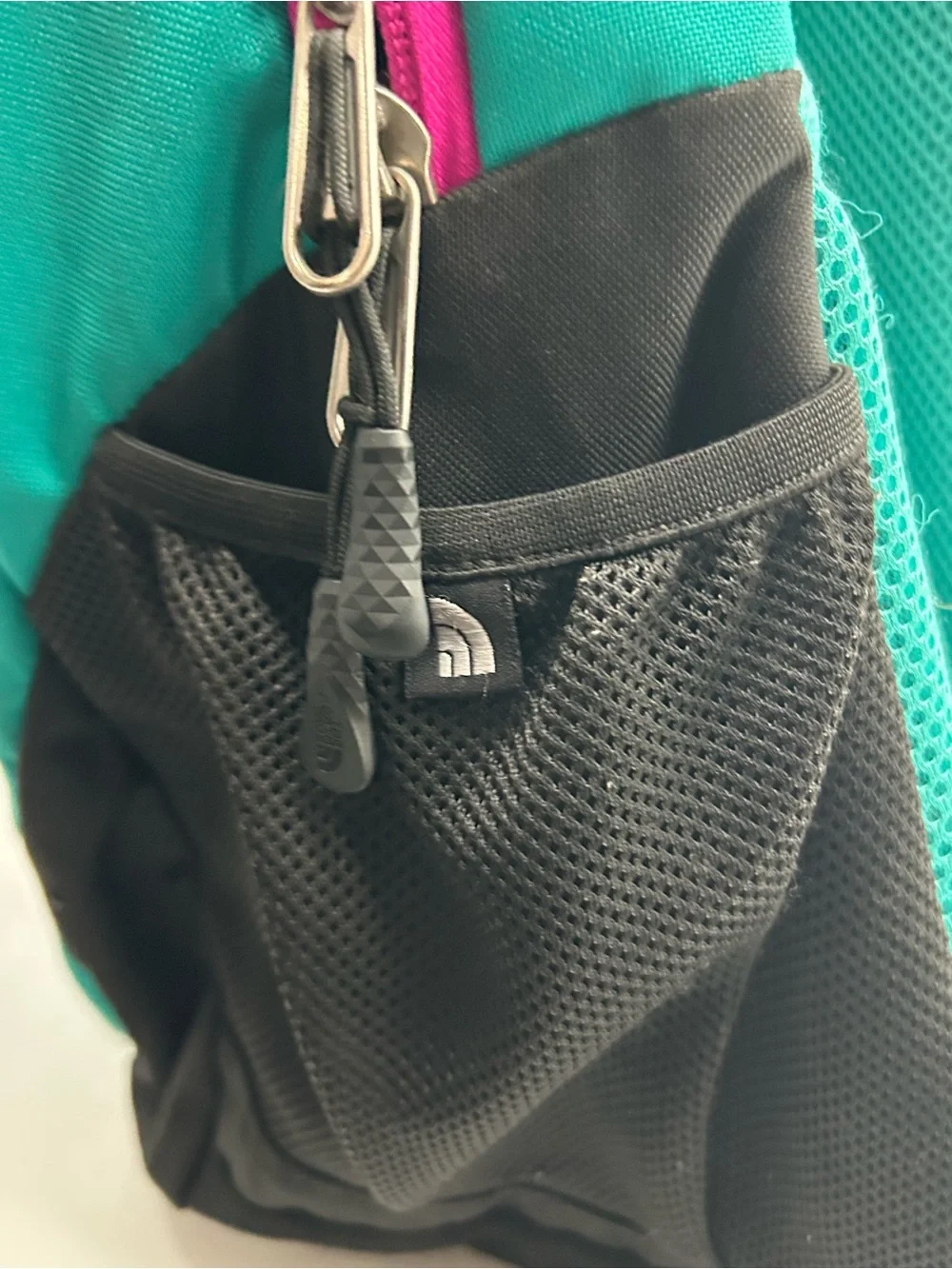 The North Face Teal Backpack with Black Trim